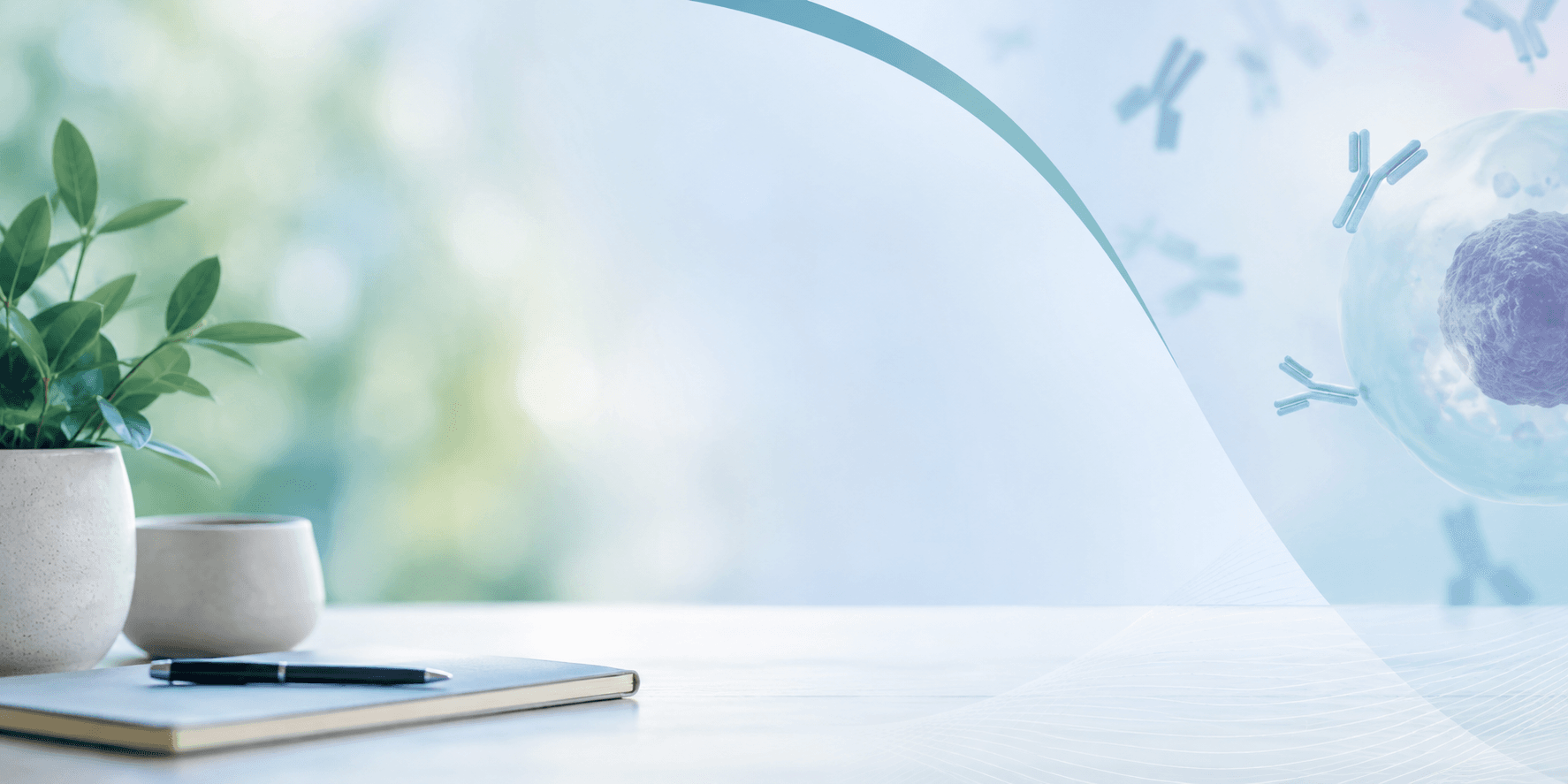 Desk with a notebook, pen, and plant beside an antibody illustration