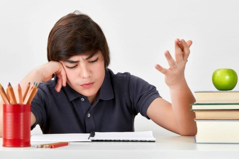 Child struggling to focus, a common sign of ADHD/ADD