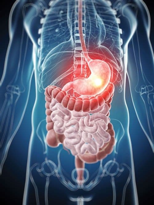 Person experiencing abdominal pain from inflammatory bowel disease